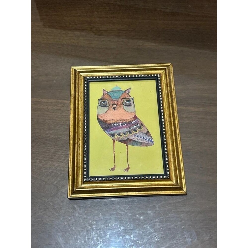 illustration of an owl wearing glasses, created British artist Ashley Percival